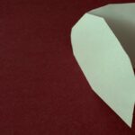 **Discover the Melancholy Muse: "Glass Half Empty" – A Haunting Poem by Ian Fletcher**